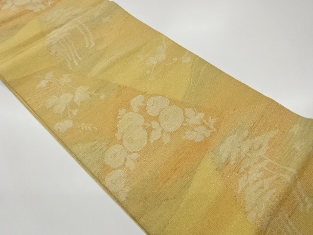 手織り紬金通し松に花々模様織出し袋帯